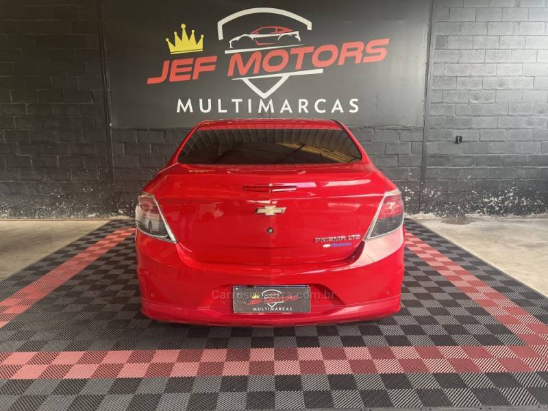CHEVROLET - PRISMA - 2014/2014 - Vermelha - R$ 49.900,00